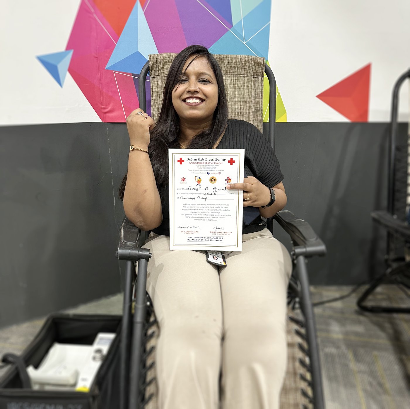 A donor with a blood-donation certificate